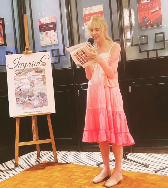 Sadie performs Bake Fail at 2023 Hong Kong International Literary Festival launch of the Women in Publishing Society's anthology Imprint 21 at the FCC